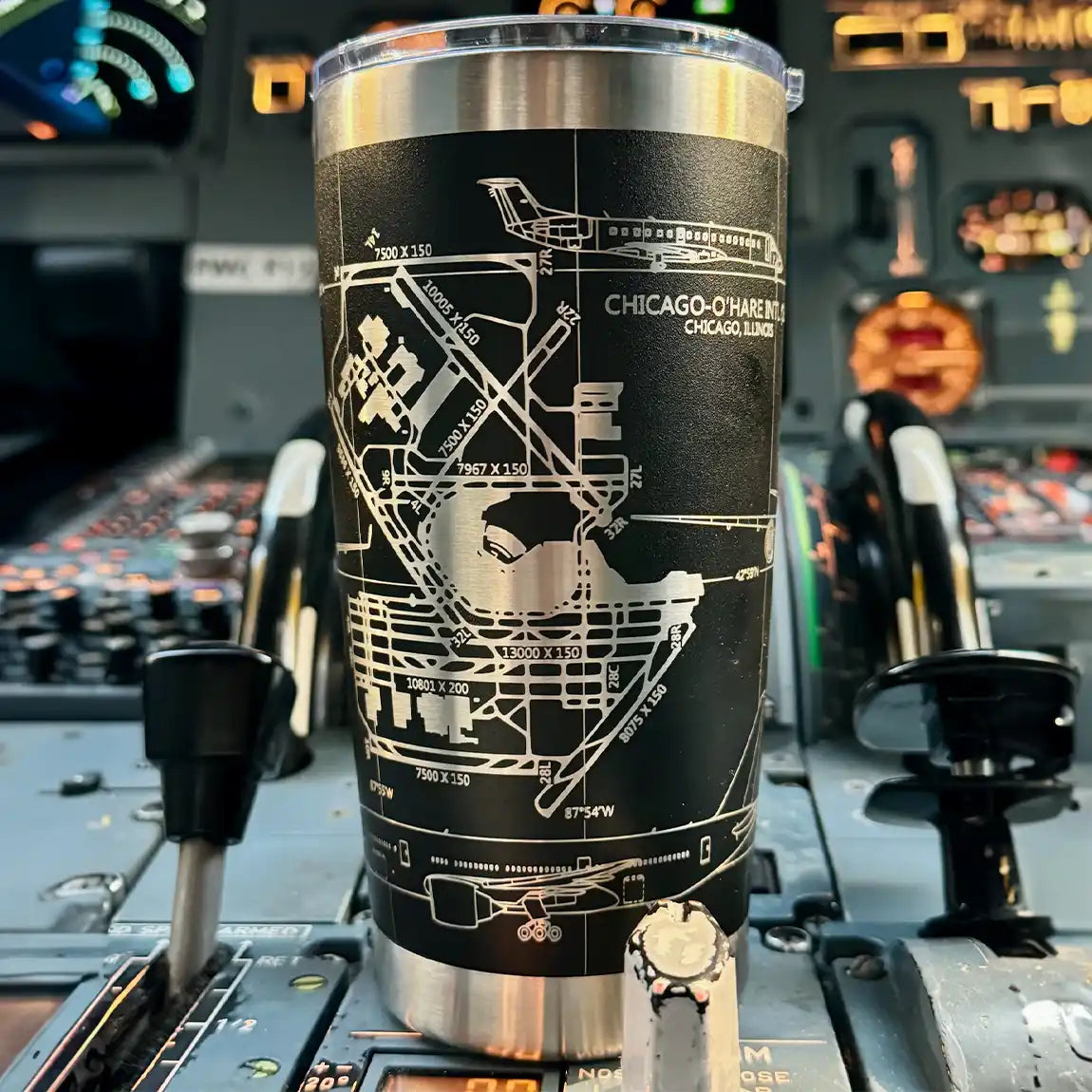 Black tumbler with airport diagram.