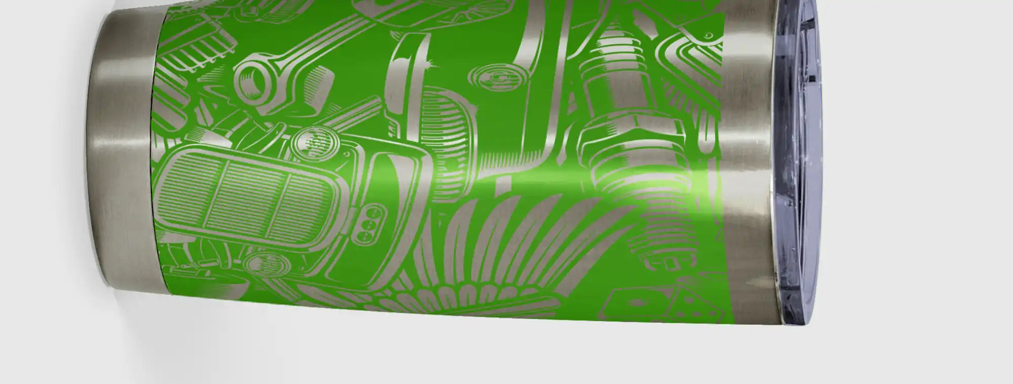 Green tumbler with engine design.